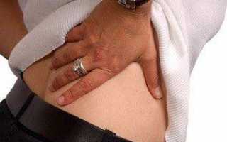 Болит спина справа внизу при